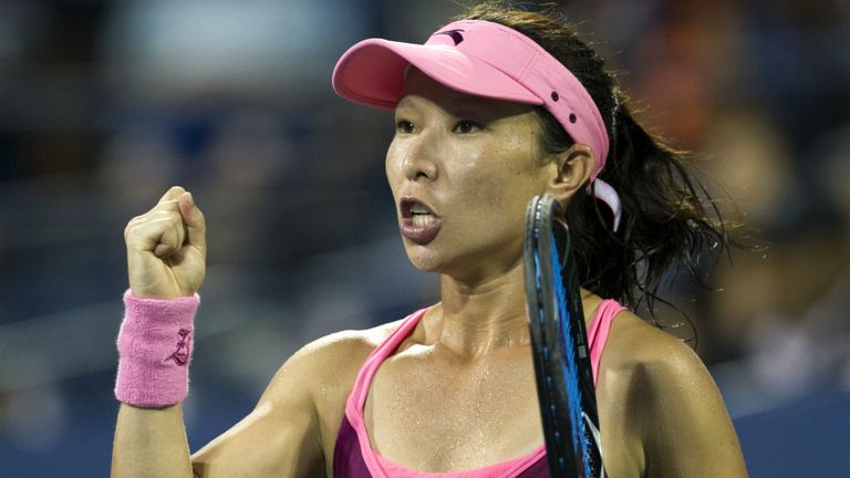 Zheng of China celebrates a point against Venus Williams of the US during their US Open 2013 womens singles match 