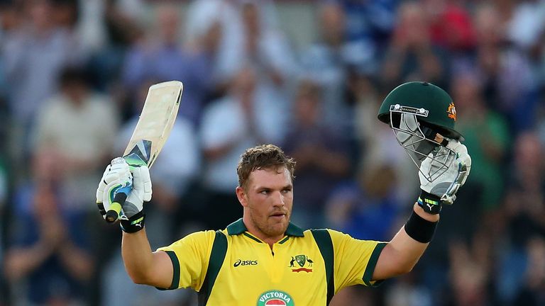 Aaron Finch celebrates his century during the 1st NatWest Series T20 match between England and Australia at Ageas Bowl
