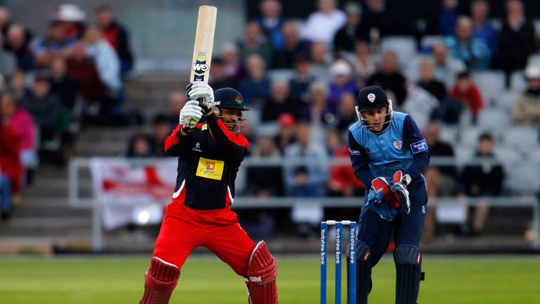 Ashwell Prince (L) of Lancashire plays a shot during the Yorkshire Bank 40 match against Derbyshire