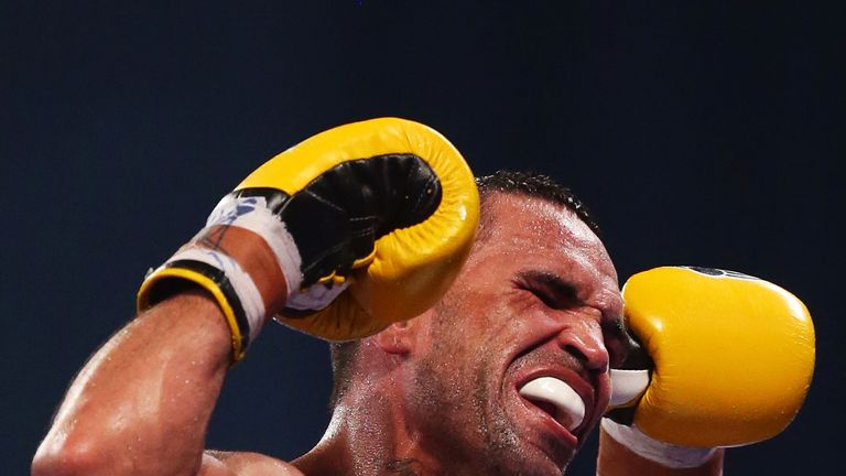 SYDNEY, AUSTRALIA - JANUARY 30:  Anthony Mundine gestures towards the crowd after the IBF Middleweight Title bout between Anthony Mundine and Daniel Geale at Sydney Entertainment Centre on January 30, 2013 in Sydney, Australia.  (Photo by Matt King/Getty Images)