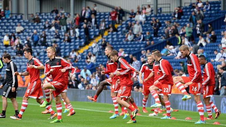 The Southampton squad warm up ahead of the Barclays Premier League match between West Bromwich Albion and Southampton at The Hawthorns 