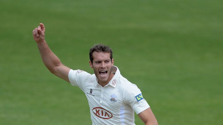 Chris Tremlett of Surrey celebrates dismissing Joe Sayers of Yorkshire during day four of the LV County Championship Division One match between Yorkshire and Surrey at Headingley on June 24, 2013 in Leeds, England