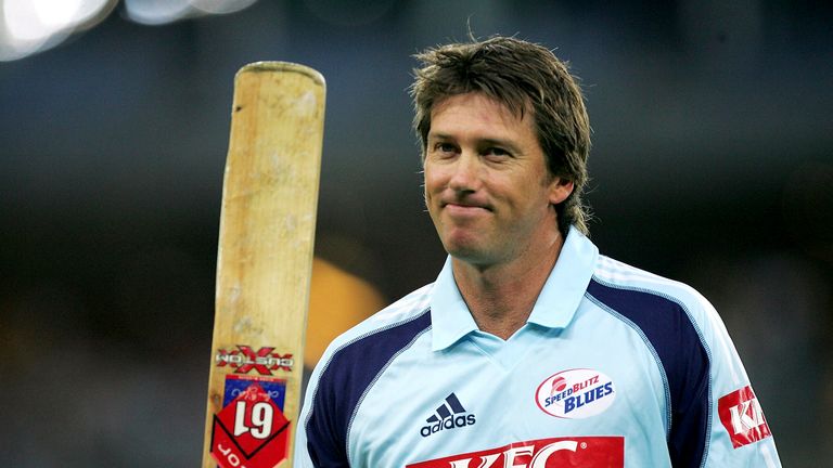 Glenn McGrath of the Blues waves to the crowd as he walks off the field after being dissmissed for a duck during the KFC Twenty20 Big Bash match between the New South Wales Blues and the Queensland Bulls