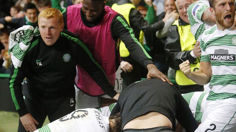Celtic Manager Neil Lennon (left) celebrates James Forrest goal during the UEFA Champions League Play-Off match, Second Leg at Celtic Park, Glasgow.