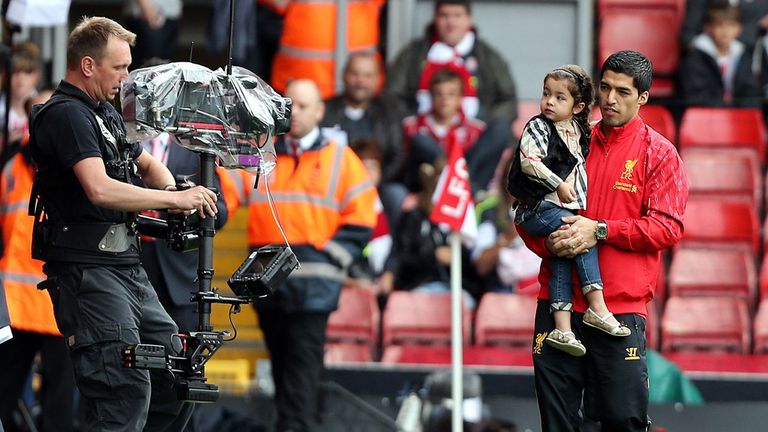 Liverpool's Luis Suarez arrives for the Barclays Premier League match at Anfield, Liverpool.