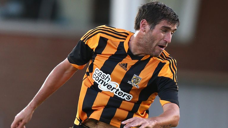 PETERBOROUGH, ENGLAND - JULY 29: Danny Graham of Hull City heads the ball during the pre season friendly match between Peterborough United and Hull City at London Road Stadium on July 29, 2013 in Peterborough, England.  (Photo by David Rogers/Getty Images)