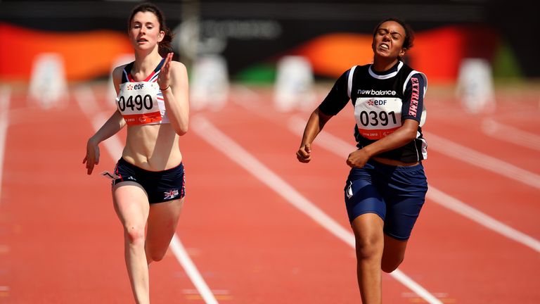 Olivia Breen of Great Britain in action along side Amal Youssef of Egypt in the Women's 100m T38 semi final during day four of the IPC Athletics World Championships on July 23, 2013 in Lyon, France.