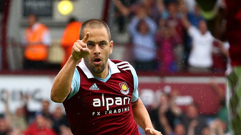 Joe Cole celebrates his opening goal for West Ham against Cardiff Cityn