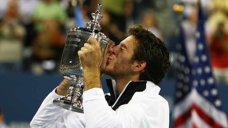 Juan Martin Del Potro kisses the championship trophy after winning the US Open in 2009.