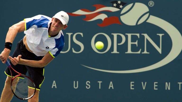 Kevin Anderson of South Africa serves to Daniel Brands of Germany during their US Open 2013 men's singles match at the USTA Billie Jean King National Center