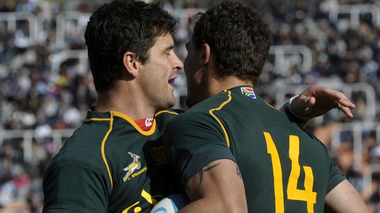 Morne Steyn celebrates with try-scorer Bjorn Basson (R)