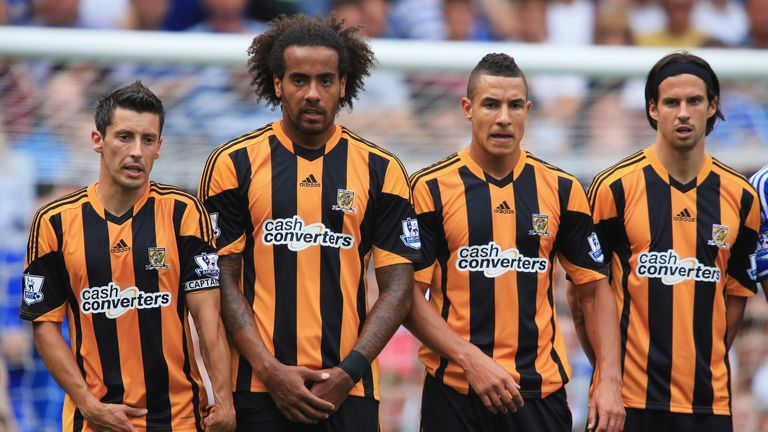 LONDON, ENGLAND - AUGUST 18: (L-R) Robert Koren, Tom Huddlestone, Jake Livermore and George Boyd of Hull City stand in the wall during the Barclays Premier League match between Chelsea and Hull City at Stamford Bridge on August 18, 2013 in London, England.