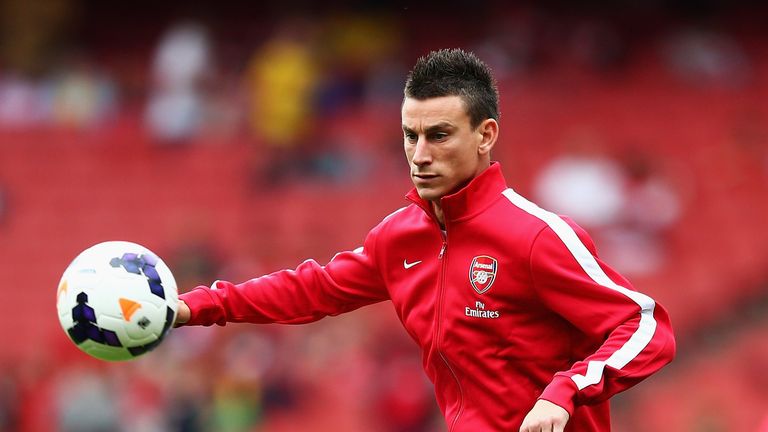 Laurent Koscielny of Arsenal warms up prior to the Barclays Premier League match between Arsenal and Aston Villa at Emirates Stadium