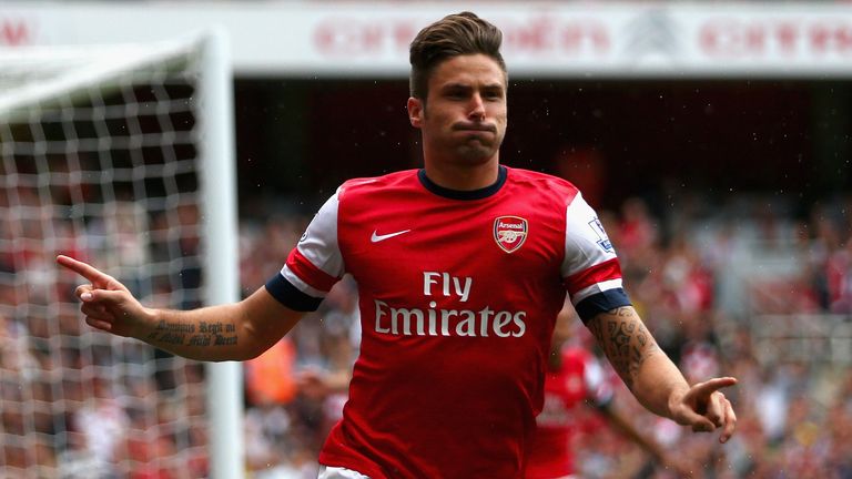 Olivier Giroud of Arsenal celebrates after scoring the opening goal during the Barclays Premier League match between Arsenal and Aston Villa at Emirates Stadium