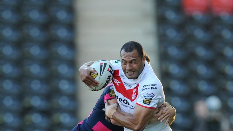 St Helens' Francis Meli is tackled by Leeds' Danny McGuire (left) during the engage Super League match at the Stobart Stadium, Widnes.
