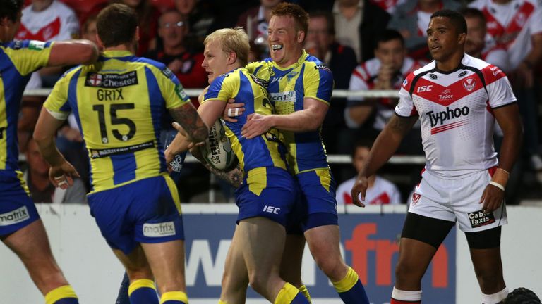 Warrington Wolves Rhys Evans celebrates a try during the Super League match against St Helens at Langtree Park