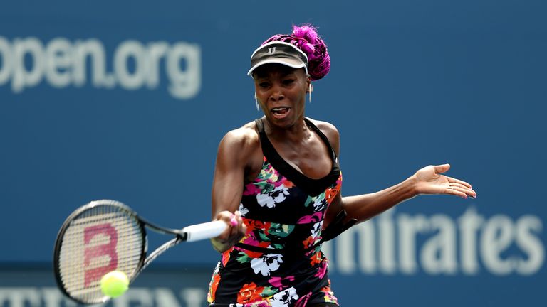 Venus Williams of the United States of America plays a forehand during her women's singles first round match against Kirsten Flipkens of Belgium first round match on Day One of the 2013 US Open