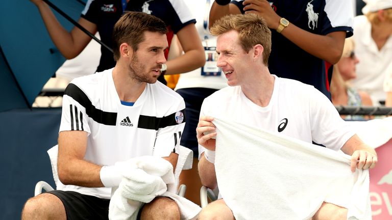 British duo Jonathan Marray and Colin Fleming talk during a break in their men's doubles first round match against Carlos Berlocq of Argentina and Eduardo Schwank at the 2013 US Open
