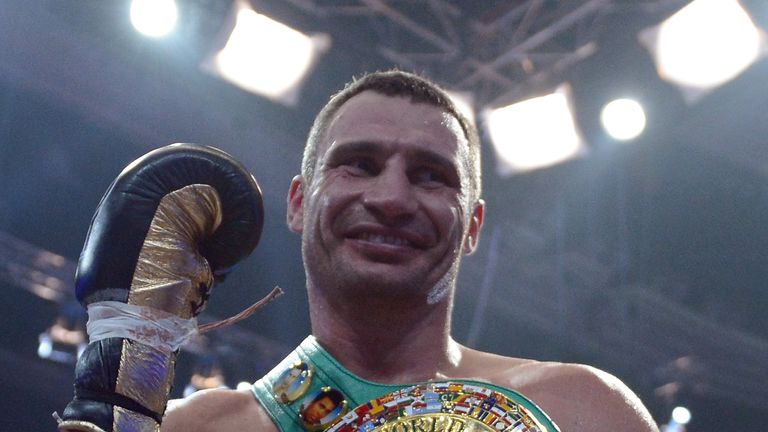 Vitali Klitschko celebrates after his WBC heavyweight title defence against Manuel Charr