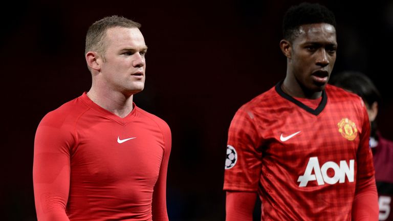 Manchester United's English forward Wayne Rooney (L) and Manchester United's English forward Danny Welbeck leave the pitch after the 1-0 defeat to CFR Cluj-Napoca during the UEFA Champions League group H football match between Manchester United and CFR Cluj-Napoca at Old Trafford in Manchester, north-west England, on December 5, 2012.  CFR Cluj-Napoca won 1-0.  AFP PHOTO/PAUL ELLIS        (Photo credit should read PAUL ELLIS,ANDREW YATES/AFP/Getty Images)