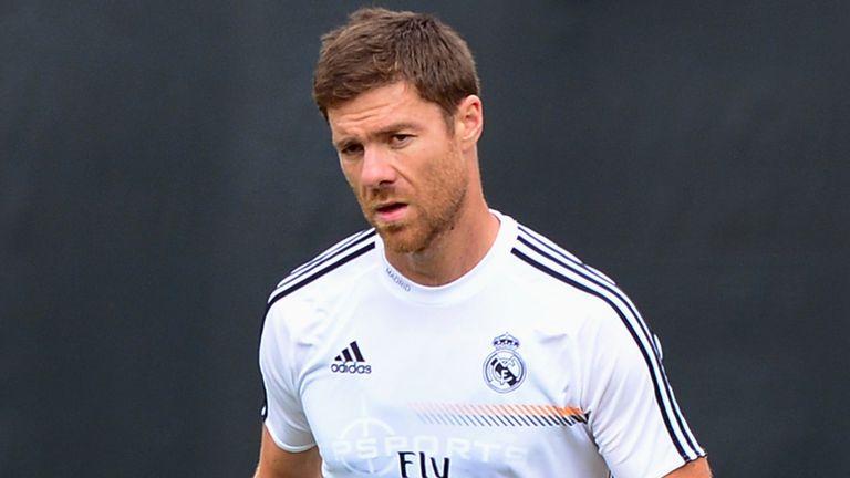 Real Madrid's Xabi Alonso warms up during a morning training session at UCLA on July 30, 2013 in Los Angeles, California. Real Madrid will play the Los Angeles Galaxy at Dodger Stadium on August 3 as part of a double header which also includes Juventus v Everton in the Guiness International Champions Cup. AFP PHOTO/Frederic J. BROWN        (Photo credit should read FREDERIC J. BROWN/AFP/Getty Images)