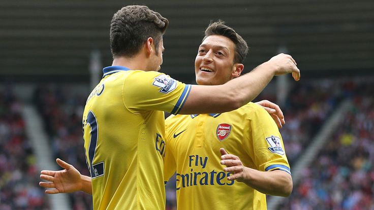 Arsenal's new boy  Mesut Ozil makes his debut for the Gunners today and has an instant impact as he sets up Olivier Giroud to make it 1-0