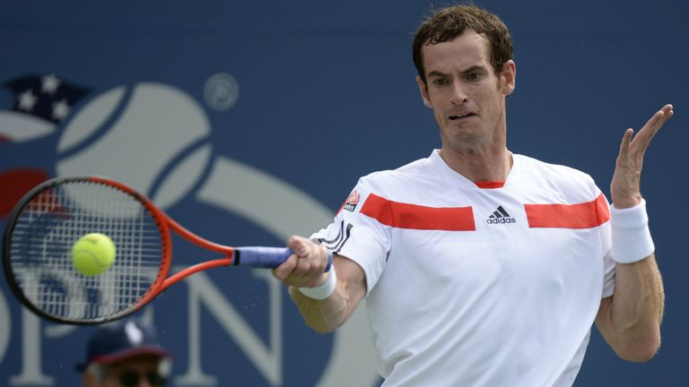 - Murray of Great Britian returns against Florian Mayer of Germany during their 2013 US Open mens singles match 