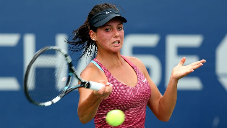 - Soylu of Turkey returns a shot during her girls singles first round match against Christina Makarova of the United States of America on Day Seven of the 2013 