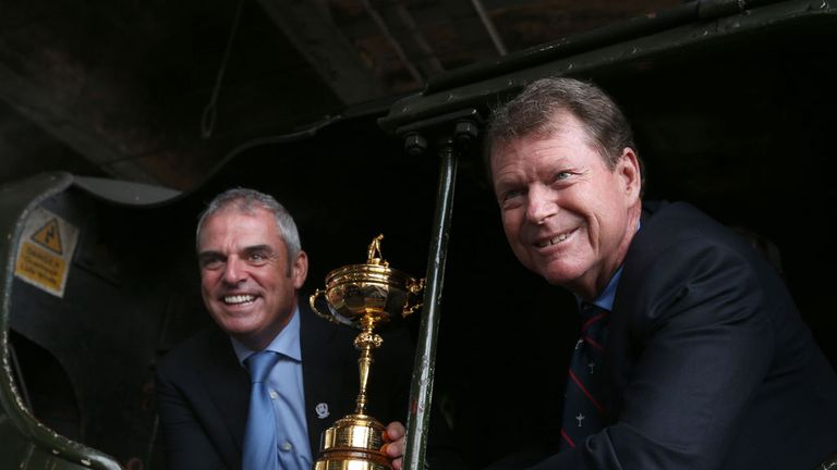 - Ryder Cup captains Paul McGinley of Europe and Tom Watson of the USA pose with the Ryder Cup trophy on a steam locomotive