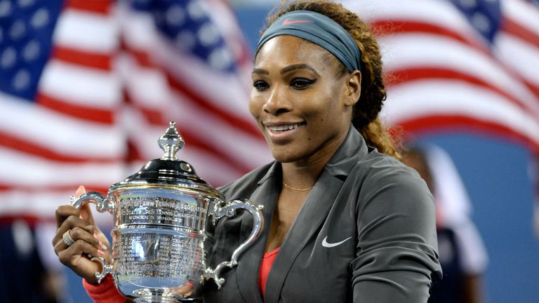 - Williams of the United States of America poses with the trophy after winning her womens singles final match against Victoria Azarenka of Belarus 