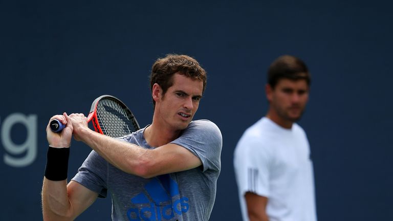 Andy Murray of Great Britain plays a backhand during a practice session oat the 2013 US Open