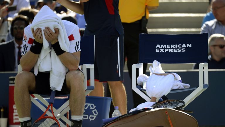 Andy Murray of Great Britian sits on the sideline as he plays against Stanislas Wawrinka of Switzerland during their 2013 US Open men's singles quarterfina match at the USTA Billie Jean King National Tennis Center in New York on September 5, 2013.   