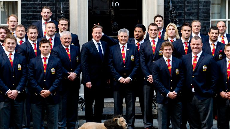 LONDON, ENGLAND - SEPTEMBER 16: Prime Minister David Cameron poses with the British Lions rugby squad including Andy Irvine the Tour Manager during an official reception at Downing Street on September 16, 2013 in London, England. The reception was to mark the British Lions victorious tour of Australia in the summer. (Photo by Chris Harris/WPA Pool/Getty Images)
