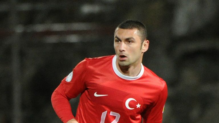 Burak Yilmaz scored the opening goal as Turkey kept their World Cup hopes alive in Romania