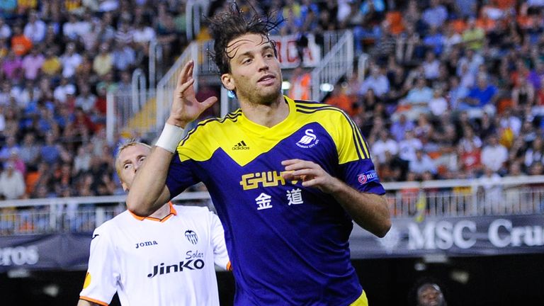 VALENCIA, SPAIN - SEPTEMBER 19:  Michu of Swansea City celebrates after scoring his team's second goal during the UEFA Europa League Group A match between Valencia CF and Swansea City at Estadi de Mestalla on September 19, 2013 in Valencia, Spain.  (Photo by David Ramos/Getty Images)