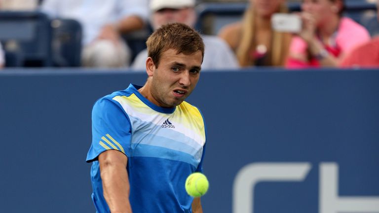 Dan Evans returns a shot during the third round of the 2013 US Open