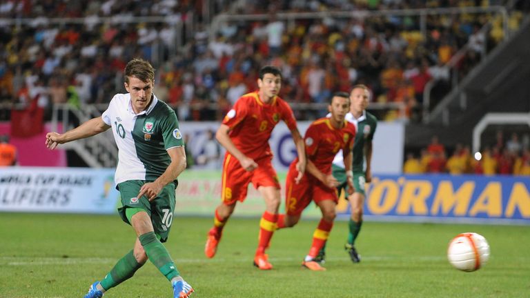 Wales' Aaron Ramsey scores the equalising goal from the penalty spot during the World Cup Qualifying, Group A match at the Phillip II Arena, Skopje, Macedonia.