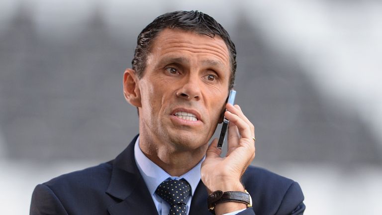 Gus Poyet looks on before the UEFA Europa League third round qualifying first leg match between Swansea City and Malmo at the Liberty Stadium on August 1, 2013 in Swansea, Wales. 