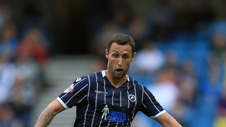 Scott McDonald of Millwall in action during the Sky Bet Championship match between Millwall and Huddersfield Town at The Den on August 17, 2013 in London, England. 