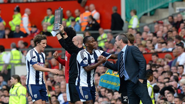 West Bromwich Albion's Saido Berahino (centre) celebrates scoring his side's second goal of the game with manager Steve Clarke (right)