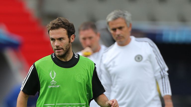Chelsea's Juan Mata is watched by manager Jose Mourinho during the training session at Stadion Eden, Prague, Czech Republic.