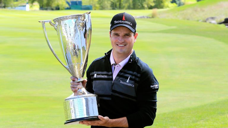 Zach Johnson holds the J.K. Wadley Trophy after winning the BMW Championship at Conway Farms Golf Club