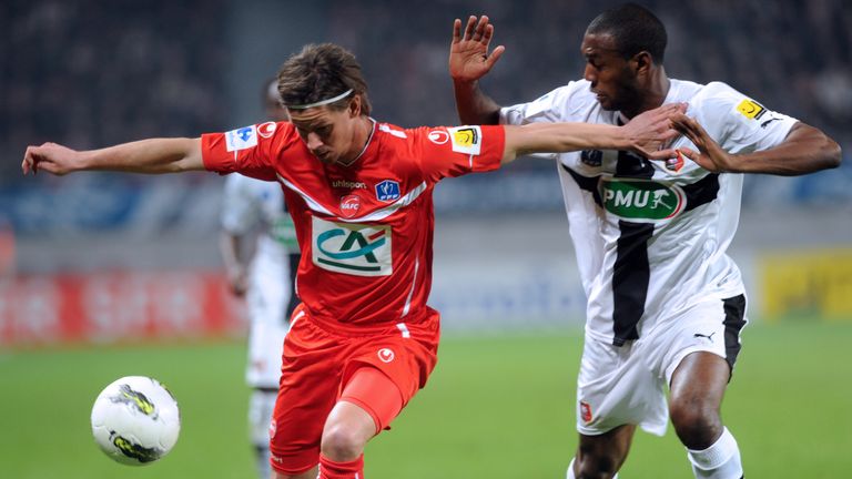 Valenciennes midfielder Dusan Djuric vies with Rennes' Kevin Theophile Catherine