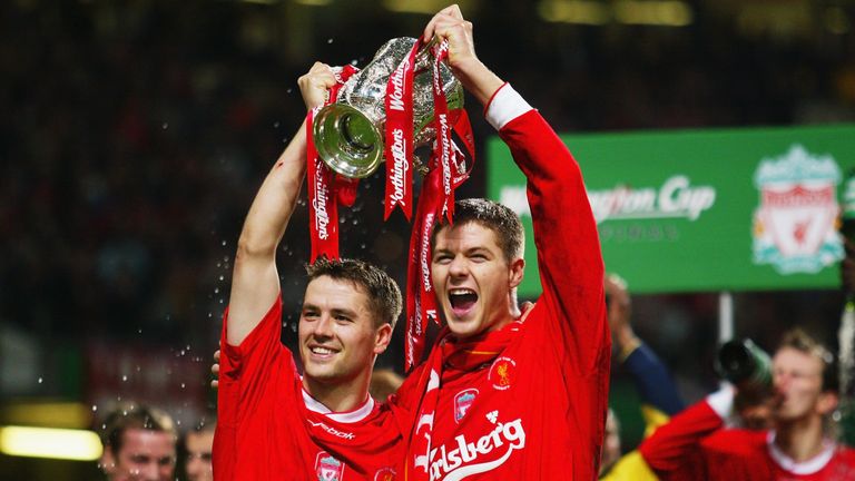 CARDIFF - MARCH 2:   Goalscorers Michael Owen and Steven Gerrard of Liverpool celebrate with the trophy during the Worthington Cup Final between Liverpool and Manchester United held on March 2, 2003 at the Millennium Stadium, in Cardiff, Wales. Liverpool won the match and final 2-0.  (Photo By Phil Cole/Getty Images)