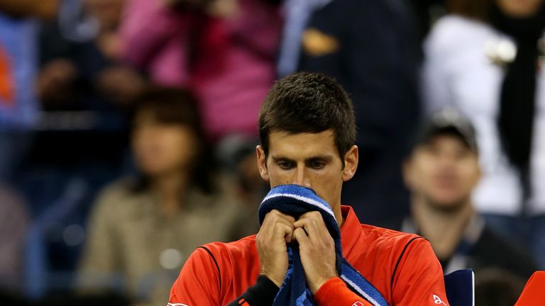 NEW YORK, NY - SEPTEMBER 09:  Novak Djokovic of Serbia reacts during a break in his men's singles final match against Rafael Nadal of Spain on Day Fifteen of the 2013 US Open at the USTA Billie Jean King National Tennis Center on September 9, 2013 in the Flushing neighborhood of the Queens borough of New York City.  (Photo by Matthew Stockman/Getty Images)