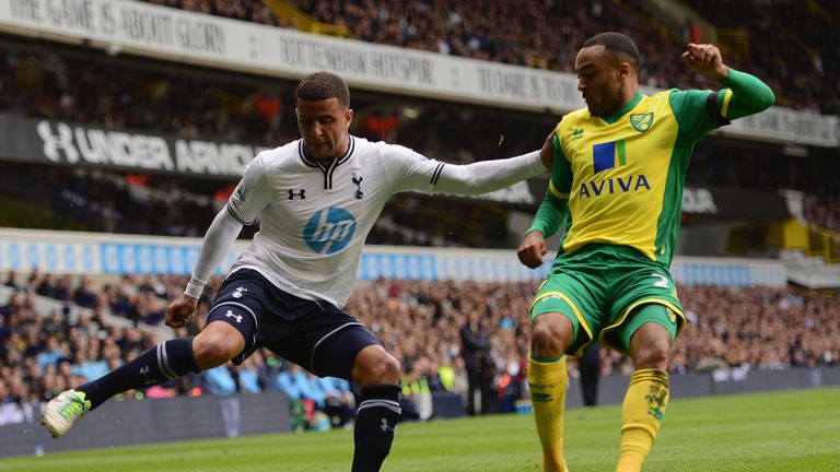 Kyle Walker of Spurs is marshalled by Nathan Redmond of Norwich City  during the Barclays Premier League match between Tottenham Hotspur and Norwich City at White Hart Lane