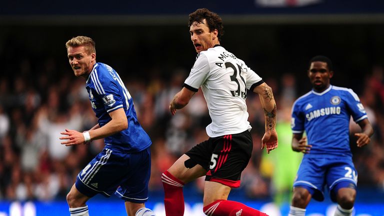 Chelsea's Andre Schurrle and Fulham's Fernando Amorebieta in action during the Barclays Premier League match at Stamford Bridge, London.