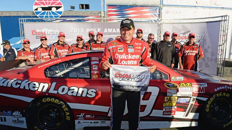 Ryan Newman, driver of the #39 Quicken Loans Chevrolet, poses in Victory Lane after qualifying for the pole position in the NASCAR Sprint Cup Series Sylvania 300 at New Hampshire Motor Speedway on September 20, 2013 in Loudon, New Hampshire