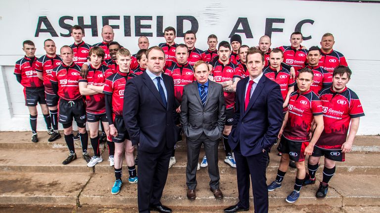 Paul Boross (C), Scott Quinnell and Will Greenwood pose for a School of Hard Knocks shot