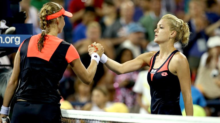 Ekaterina Makarova of Russia is congratulated by Agnieszka Radwanska of Poland during their third round match on Day Seven of the 2013 US Open at USTA Billie Jean King National Tennis Center on September 1, 2013 in the Flushing neighborhood of the Queens borough of New York City